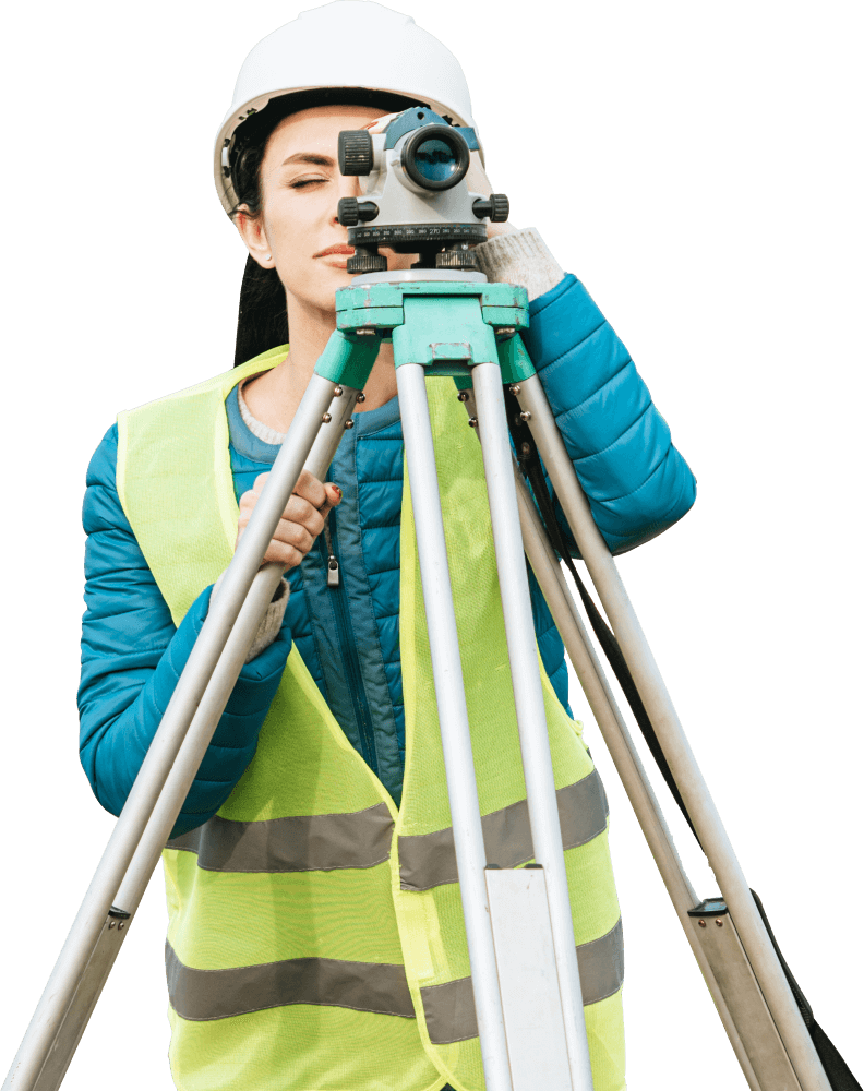 Mujer topógrafa midiendo terreno con un nivel digital